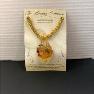 Art Glass pendant created using master craftsmanship w/ artistic European flair.